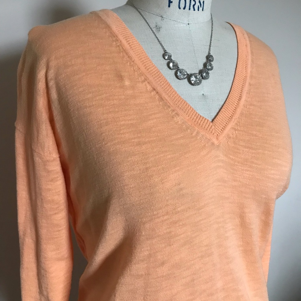 j. crew orange sweater, size small.